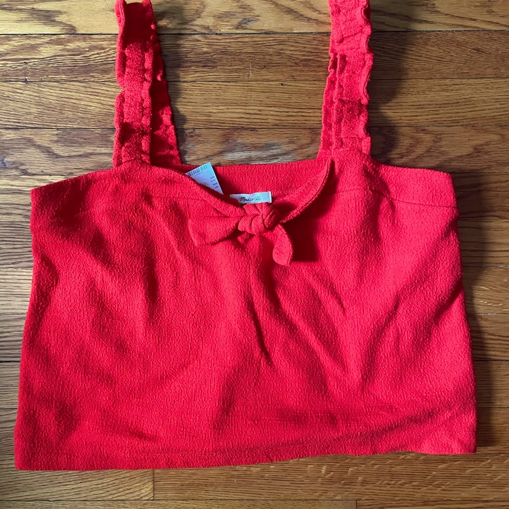 Red sleeveless top